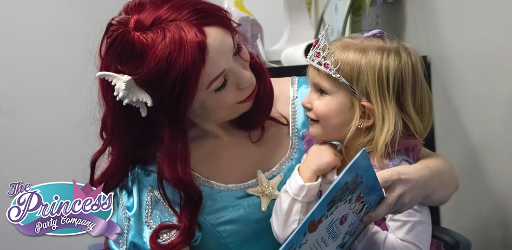 Ariel shares a story at a birthday party